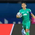 Sunil Chhetri, captain of Bengaluru FC, holding the match ball during an Indian Super League game.