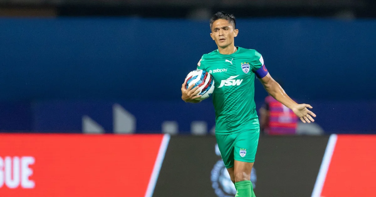 Sunil Chhetri, captain of Bengaluru FC, holding the match ball during an Indian Super League game.
